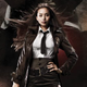 Eihi Shiina is wearing a black trench coat, a skirt, a white shirt, and a necktie.